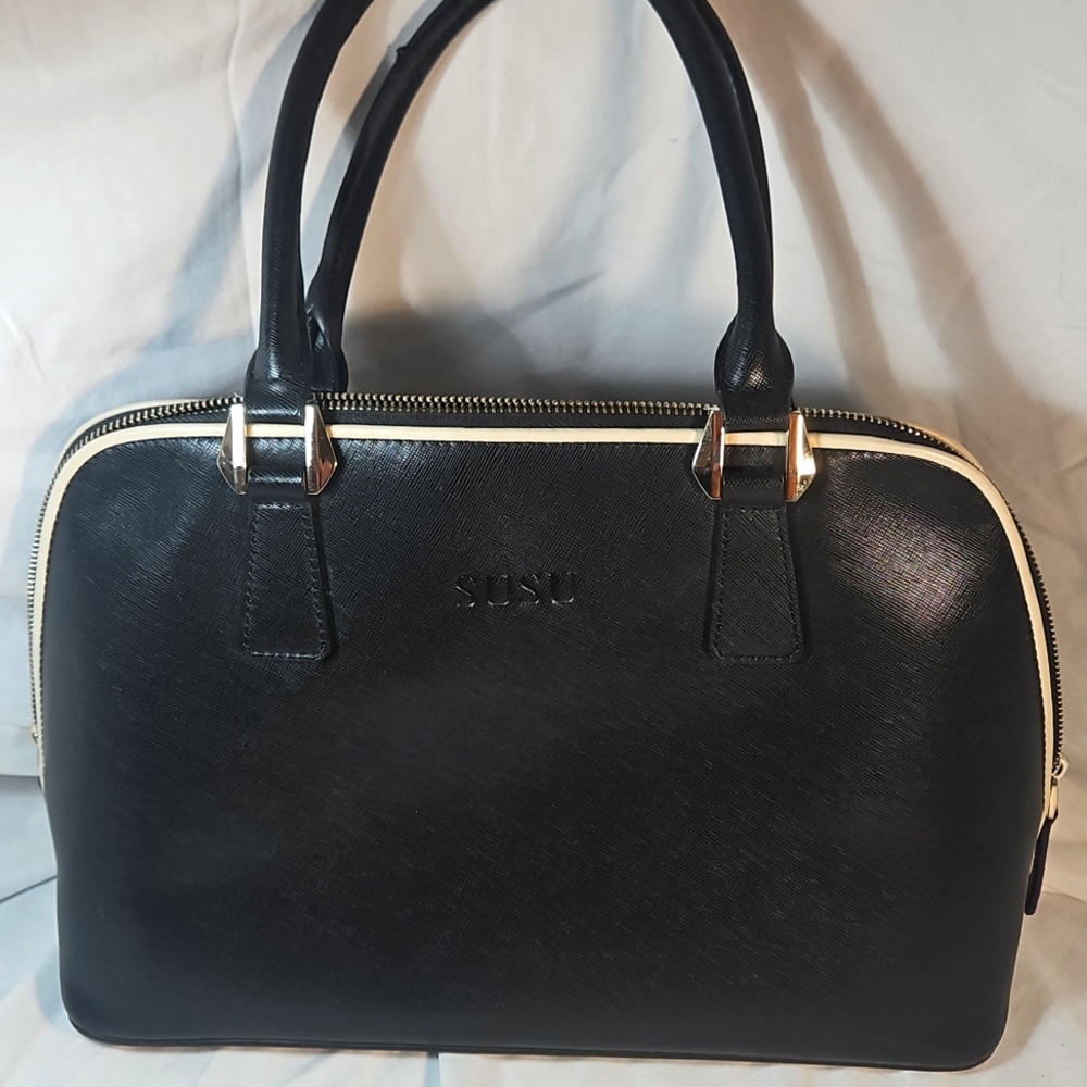 Black SUSU Satchel with Cream Trim and Structured Design